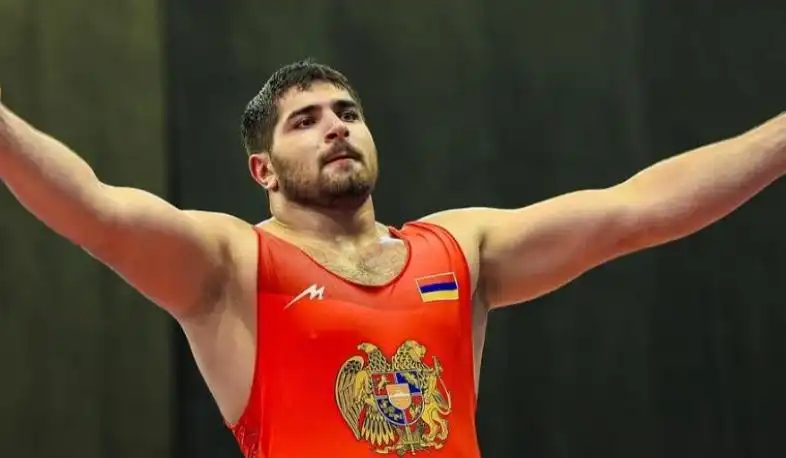 Ըմբիշ Ռազմիկ Քիւրդեանը արծաթէ մետալակիր 